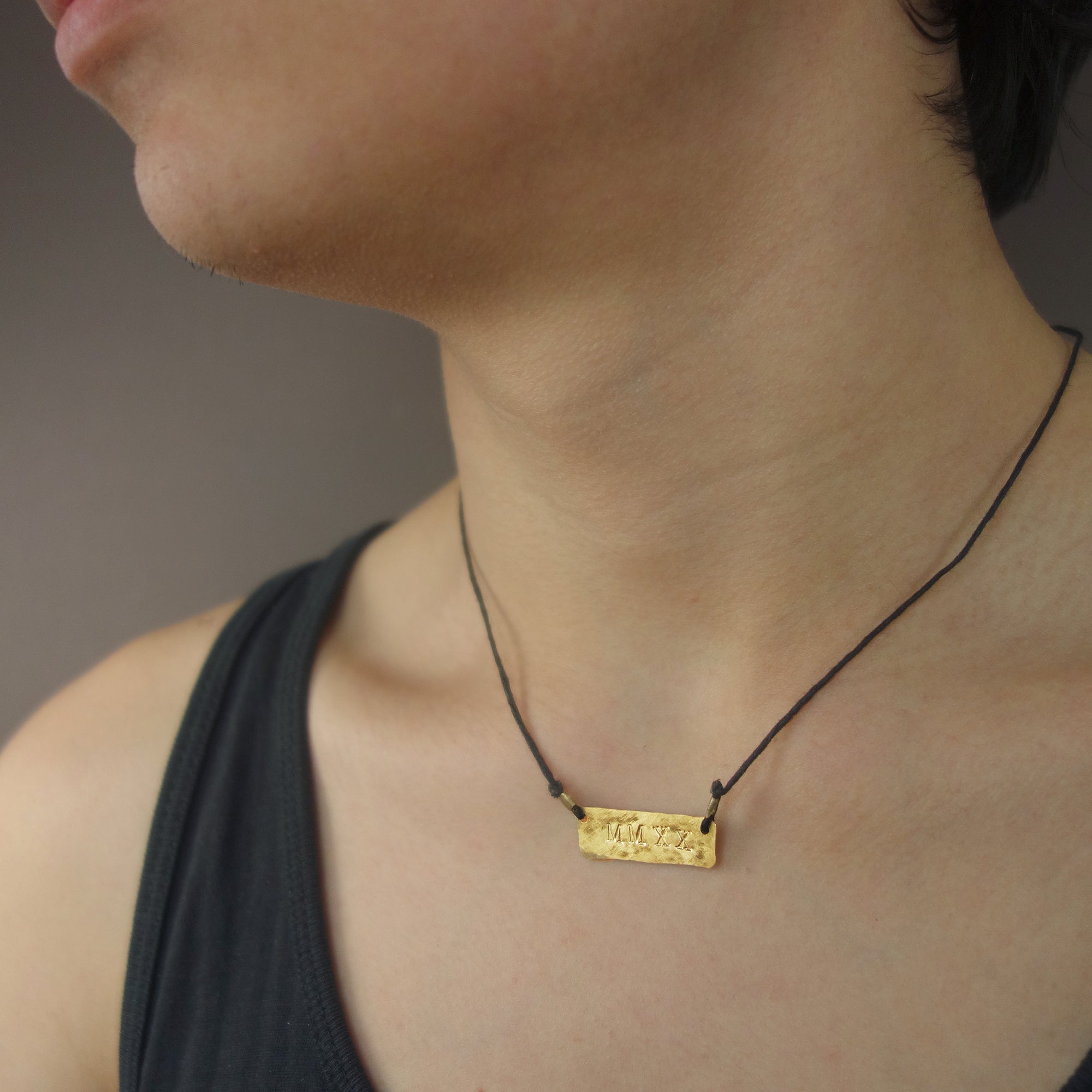 MMXXI: hand hammered gold on leather necklace/bracelet