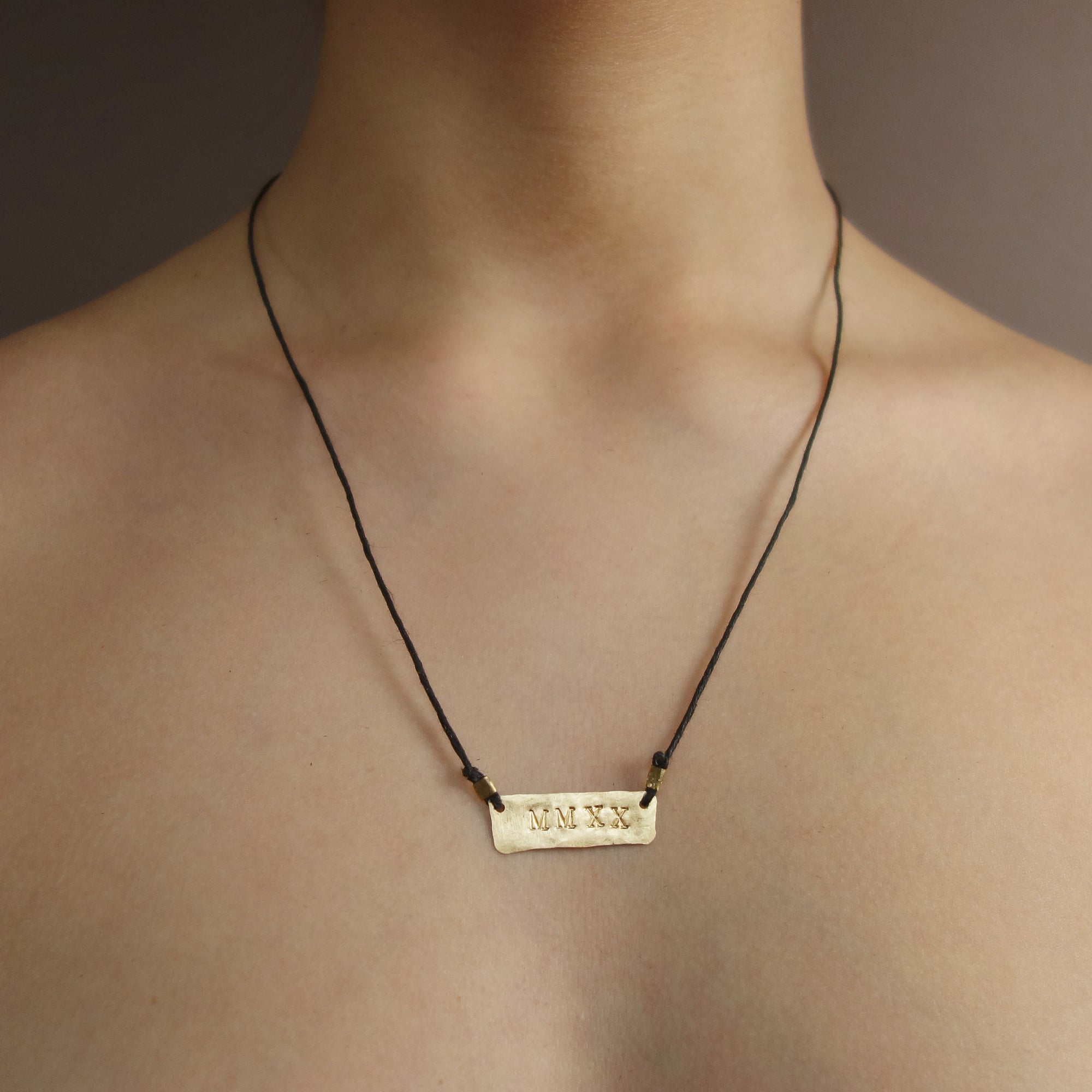 MMXXI: hand hammered gold on leather necklace/bracelet