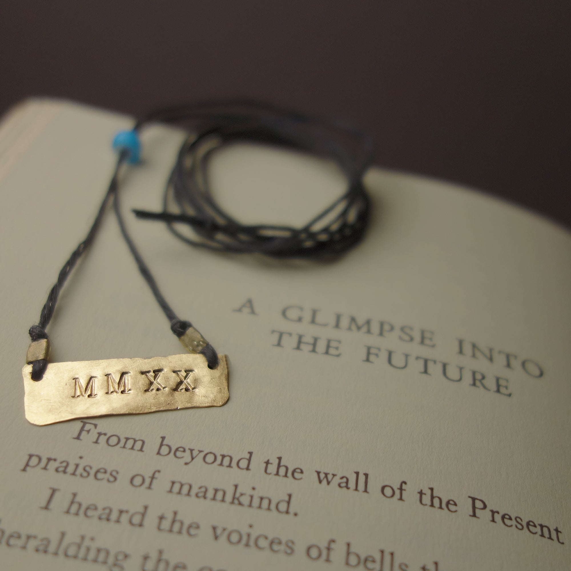 MMXXI: hand hammered gold on leather necklace/bracelet