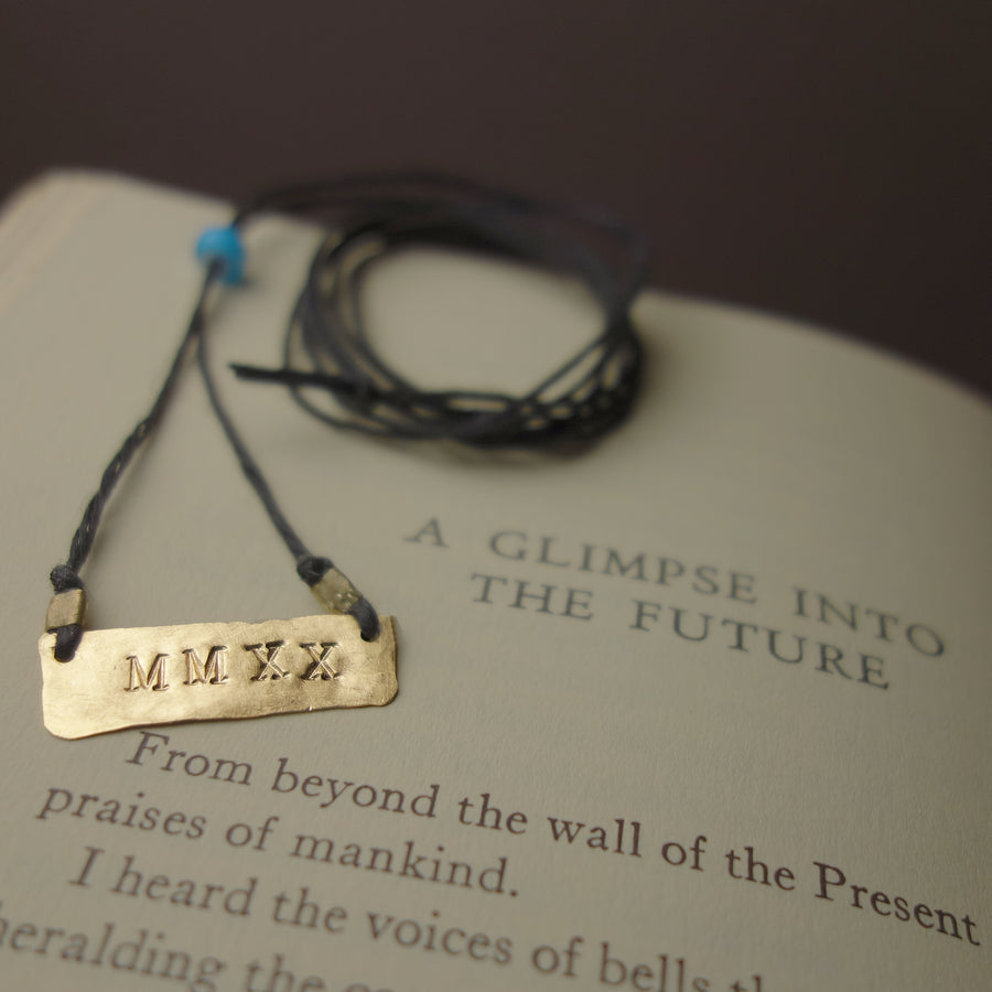 MMXXI: hand hammered gold on leather necklace/bracelet