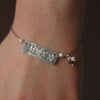 MMXXI stamped silver bracelet, with your school colors (gemstones)