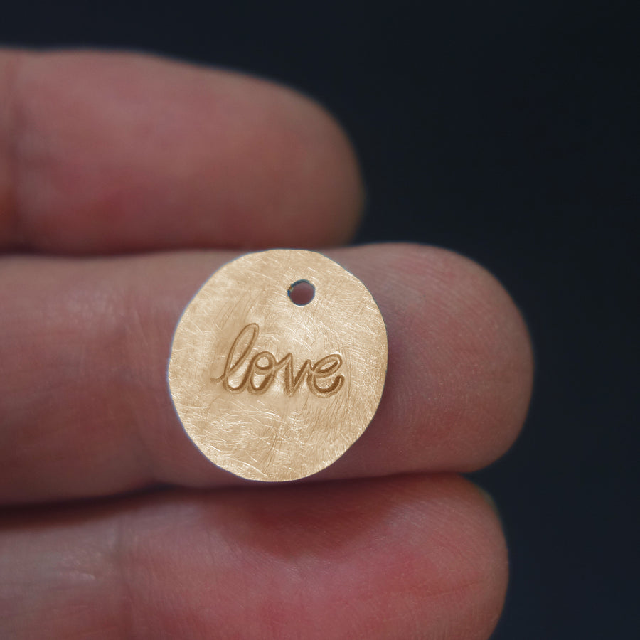 Love hand hammered charm
