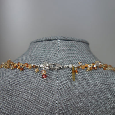 Star Light, Star Bright pink sapphire, zircon, and hessonite garnet necklace