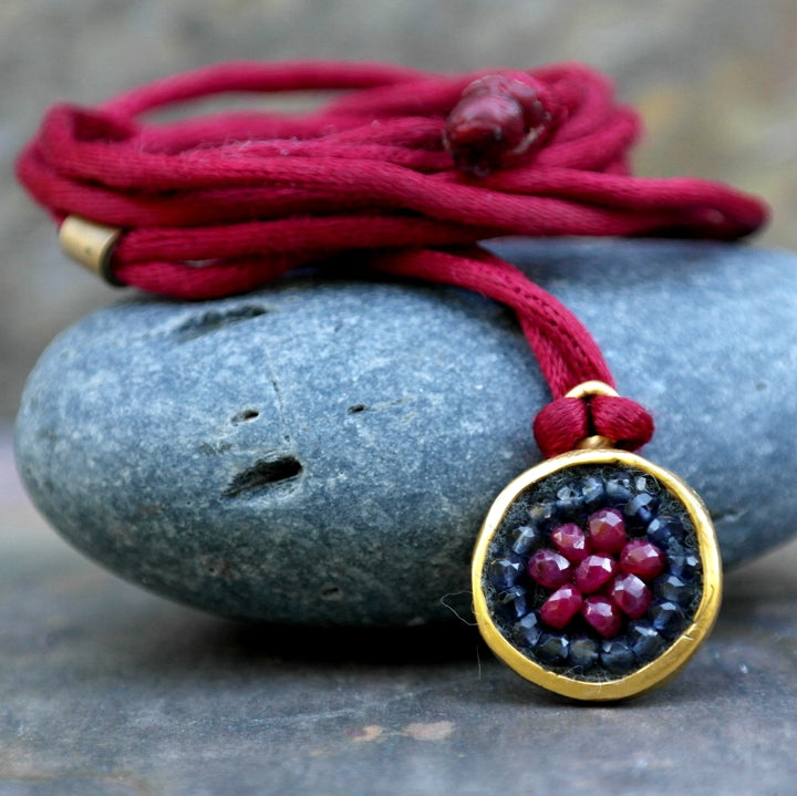 Ruby and iolite on silk