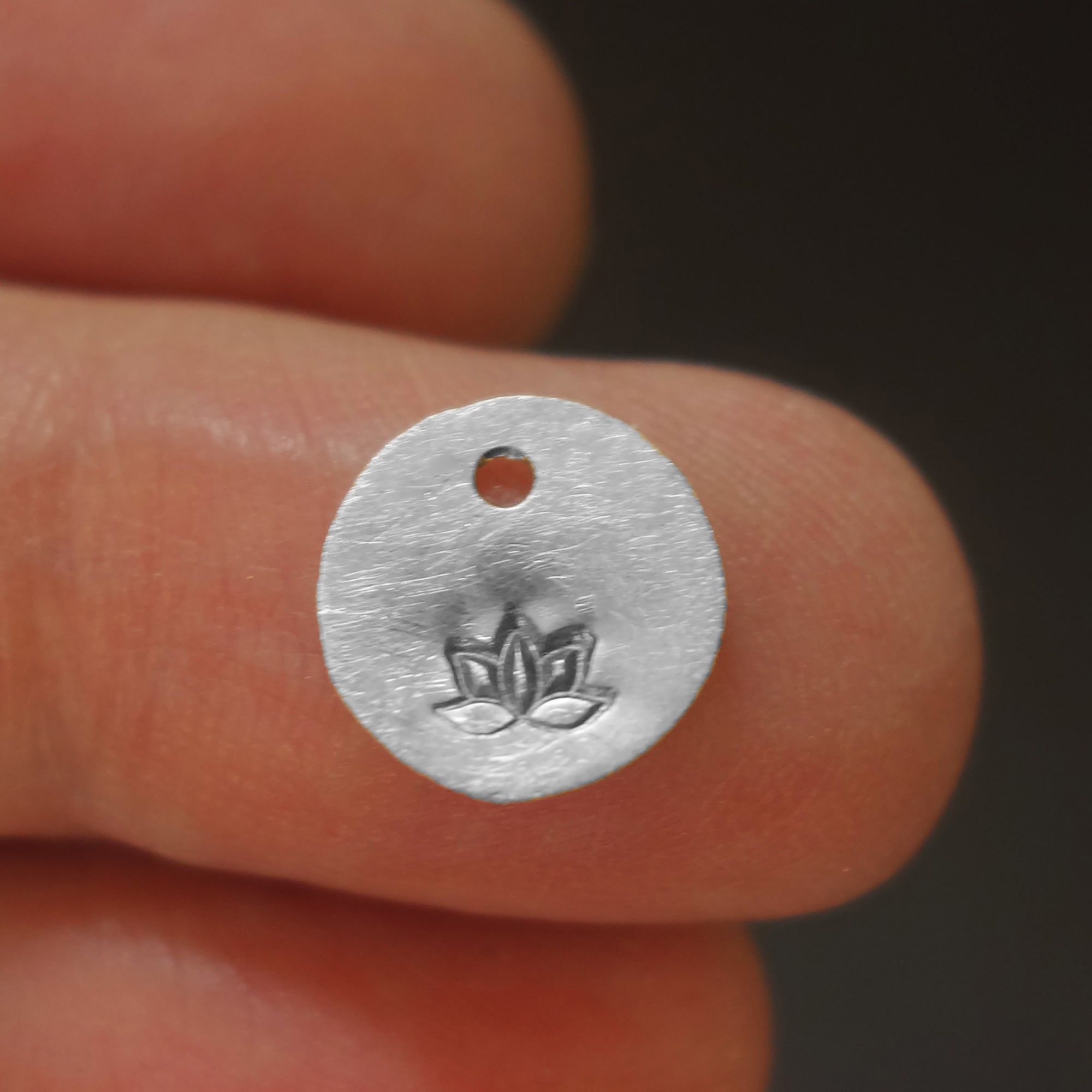 Lotus hand hammered charm