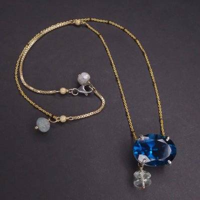 Here She Comes Just a Walkin' Down the Street: London blue topaz on gold